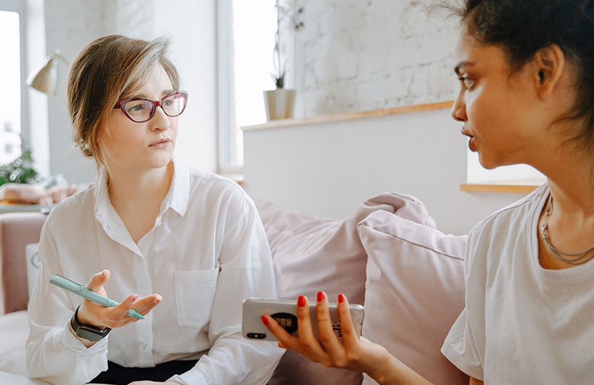 Two girls talking info-7